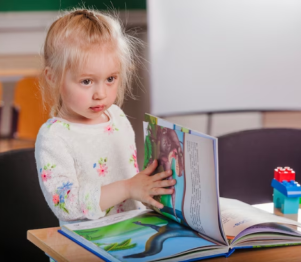 Children participating in creative learning activities and hands-on exploration at Daily Bread Child Care Development Center in Laurinburg, NC