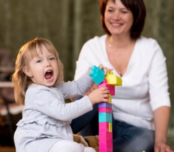 Group of children collaboratively learning together in a supportive, educational environment at Daily Bread Child Care Development Center