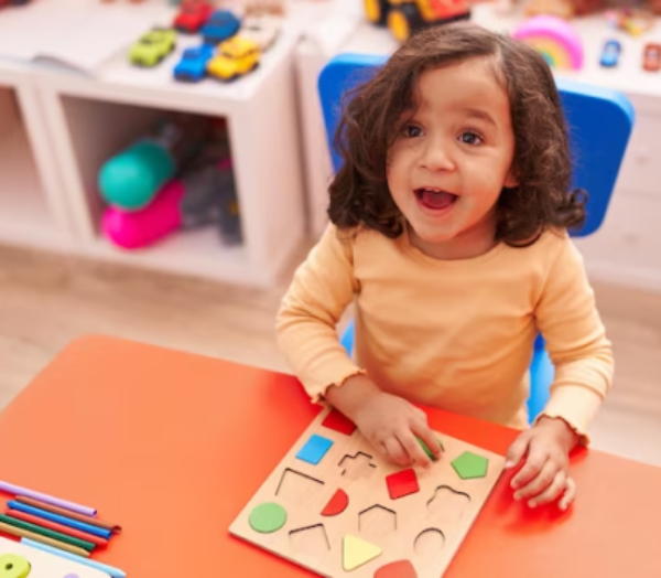 Toddlers aged 2-5 engaged in discovery play and learning through the Creative Curriculum at Daily Bread Child Care Development Center
